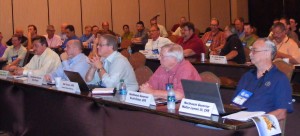 Governors front of business meeting